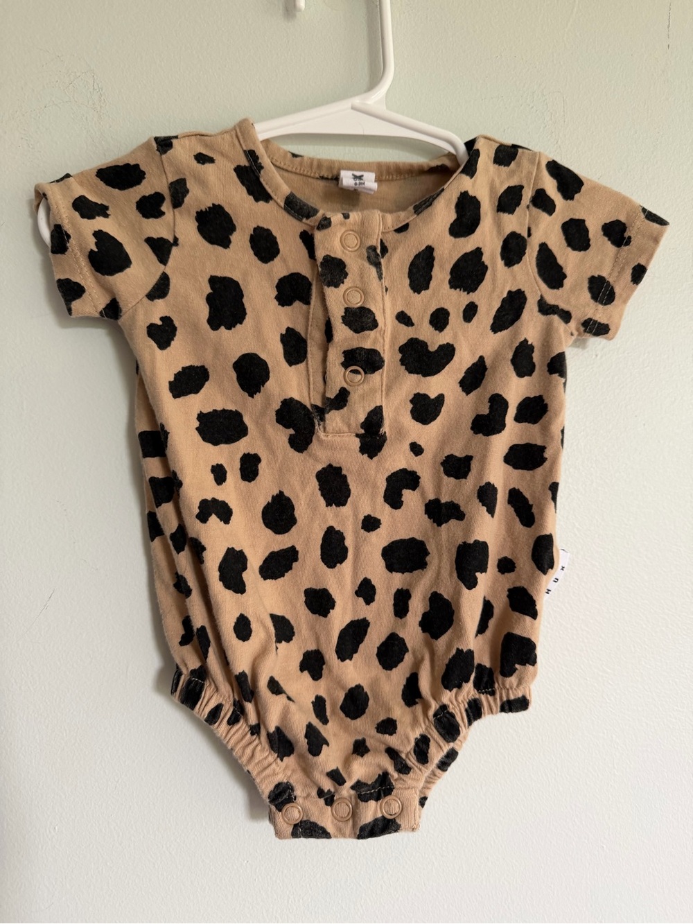 Hux Leopard Spot Baby Onesie — Tan & Black